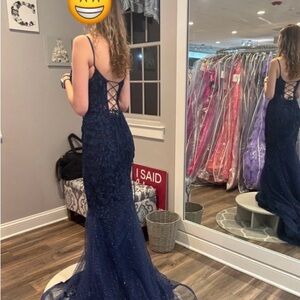 Prom dress size 0, hemmed to fit 5’3” and 2” heels.  Can be bustled.